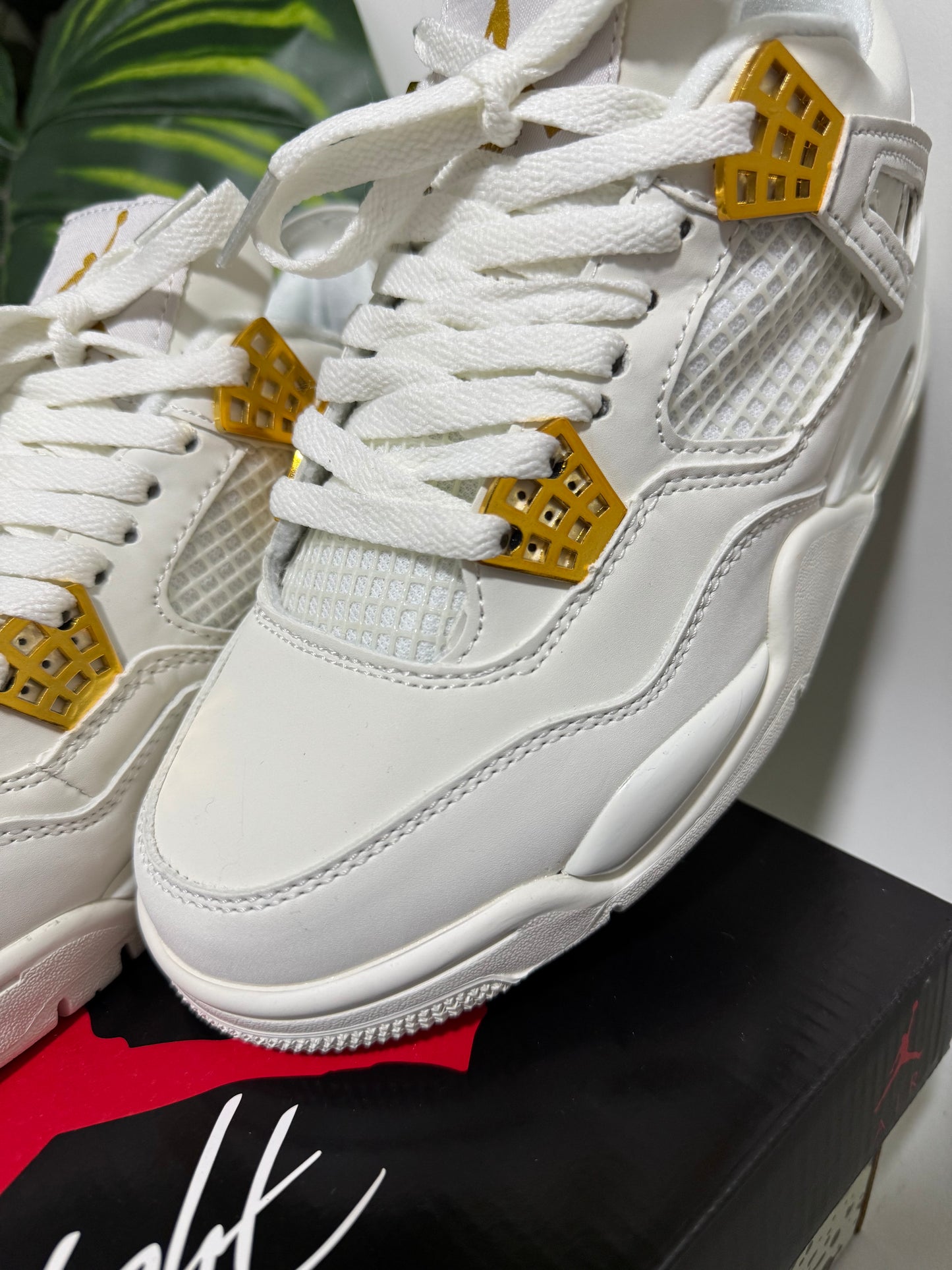 Air Jordan 4 Metallic Gold